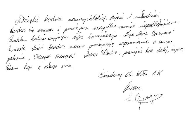 Odręczny wpis Edwarda Ojrzyńskiego do księgi pamiątkowej szkoły.