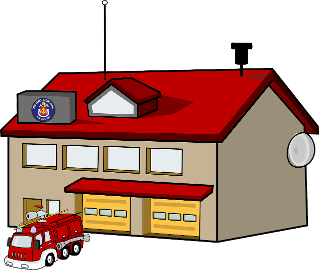 Rysunek budynku straży wraz z wozem strażackim